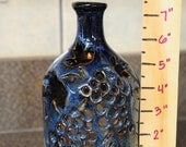 7-1/2" tall Stoneware Pottery Bottle Tealight/Luminaire with Grapes and Leaves