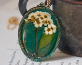 pressed flower necklace. resin jewelry. bridal flower bouquet set on verdigris patina. long gold chain emerald green.