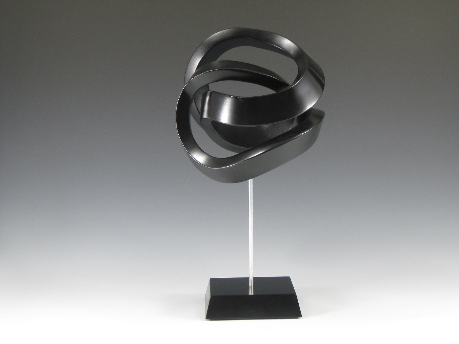 Modern Abstract Wood sculpture   entitled  Tight Fit