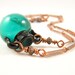 Teal glass vessel and copper vintage necklace