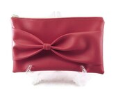 Pink wristlet bow bag