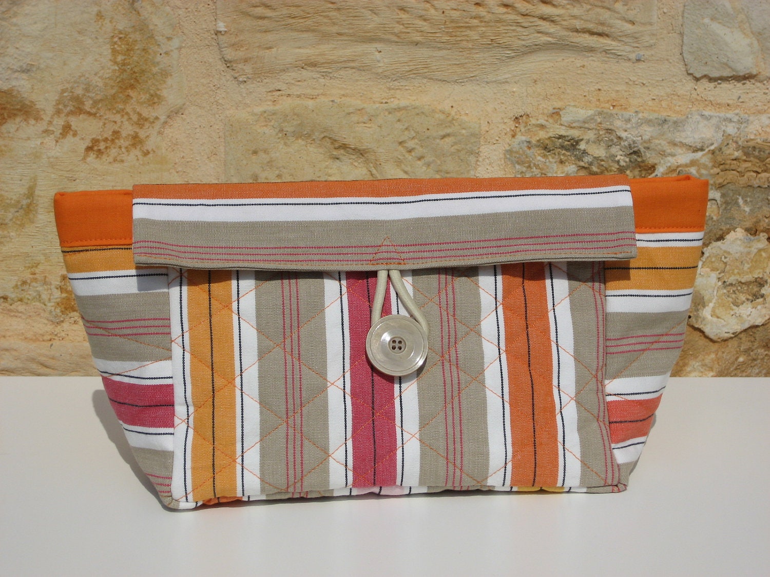 Small bag, make-up bag, fabric basket with stripes in orange, red, beige and white