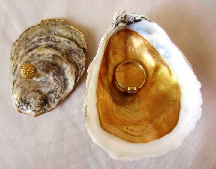 gilded oyster box with textured vintage button