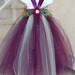 Plum, Ivory & Sage Peacock tutu dress. Plum crocheted top with eggplant/plum  and sage tulle,with broach and peacock feather embellishments.