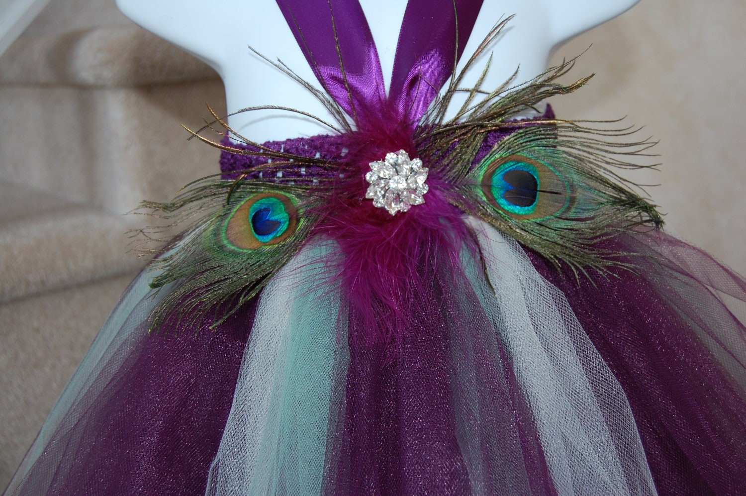 Plum, Ivory & Sage Peacock tutu dress. Plum crocheted top with eggplant/plum  and sage tulle,with broach and peacock feather embellishments.