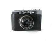 Black Smena 8 Cmena 8 Camera with its original black detachable case