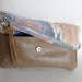 Ikat and leather fold over clutch