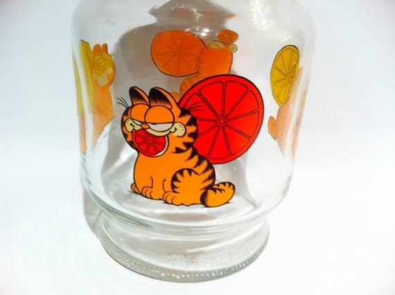 Vintage Garfield glass carafe juice pitcher with lid.
