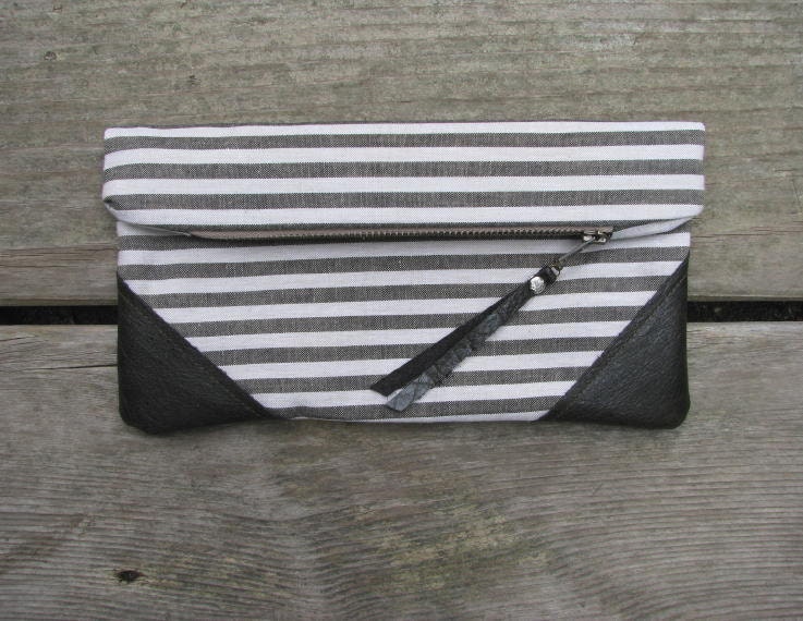 cotton and leather clutch