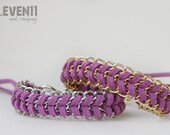 Arm candy in your choice of color. Chevron braided bracelet. Violet with gold and silver chain pictured.