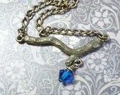 Tree Branch Necklace With a Deep Blue Swarovski Crystal by vintagerust