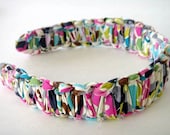 JorJa Band - knotted fabric headband, shades of pink, blue, brown, grey and green.