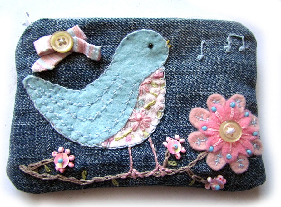 Handmade recycled blue bird denim zip purse.