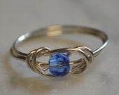 Sapphire love knot ring sterling silver wire handmade with Swarovski crystal September birthstone Jewelry made to order