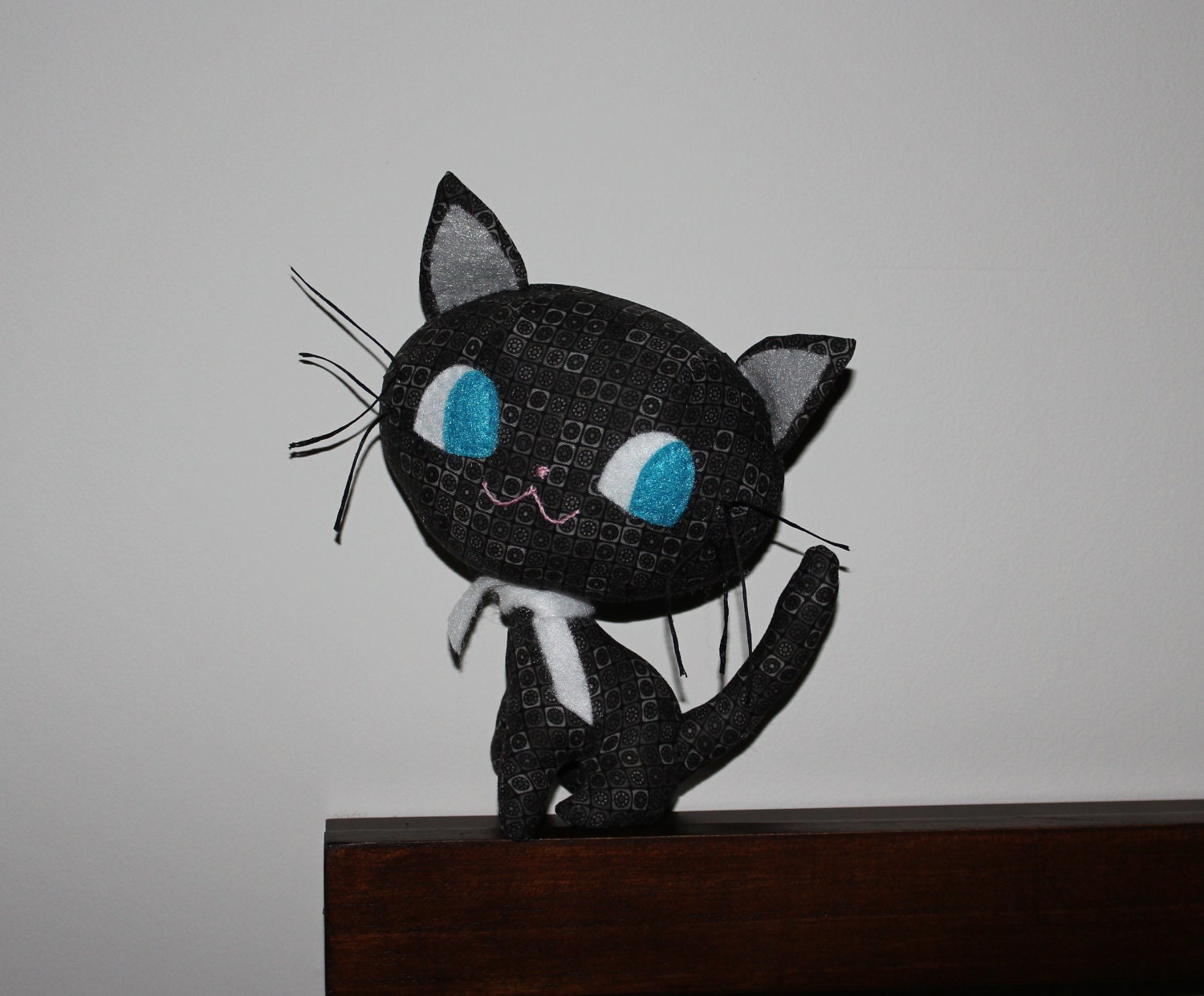 black cat soft toy