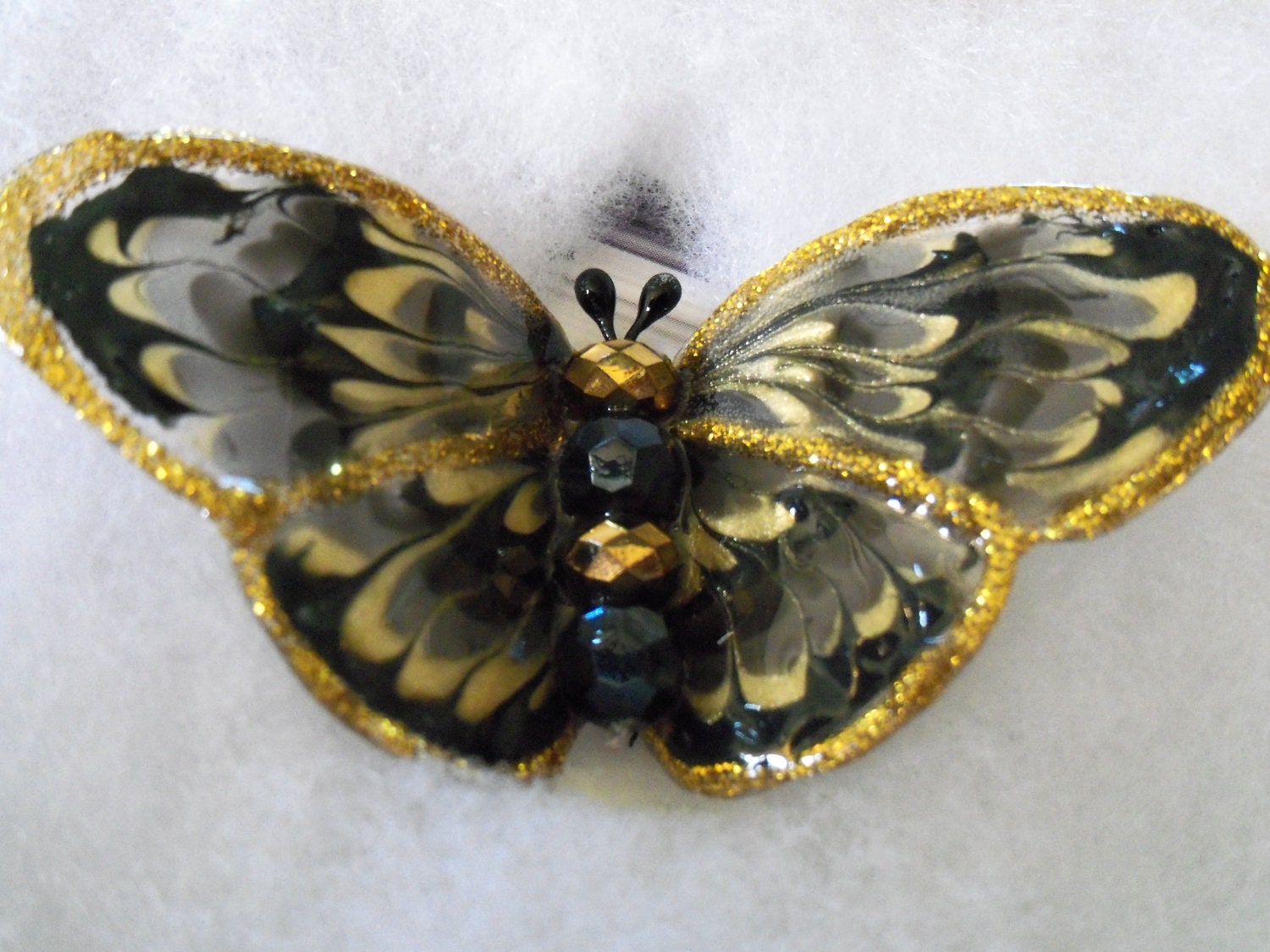 black and gold butterfly brooch