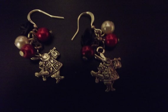 White rabbit themed Alice in Wonderland earrings.