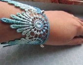 Bracelet lace blue with silver heart beads and silver plated toggle