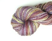 Handspun yarn sport weight merino bamboo silk hand painted single ply purple burgundy yellow gold 4.1 oz., 336 yds. Genevieve