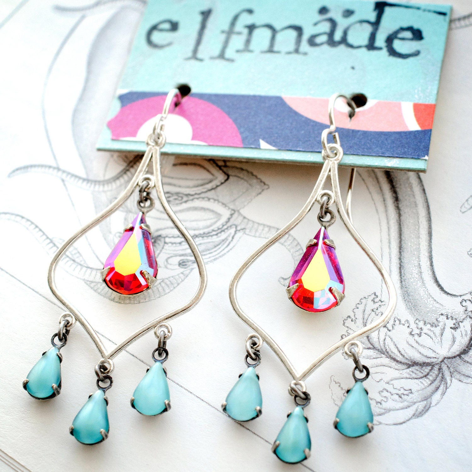 moroccan sunset. chandelier earrings with orange and turquoise teardrops.