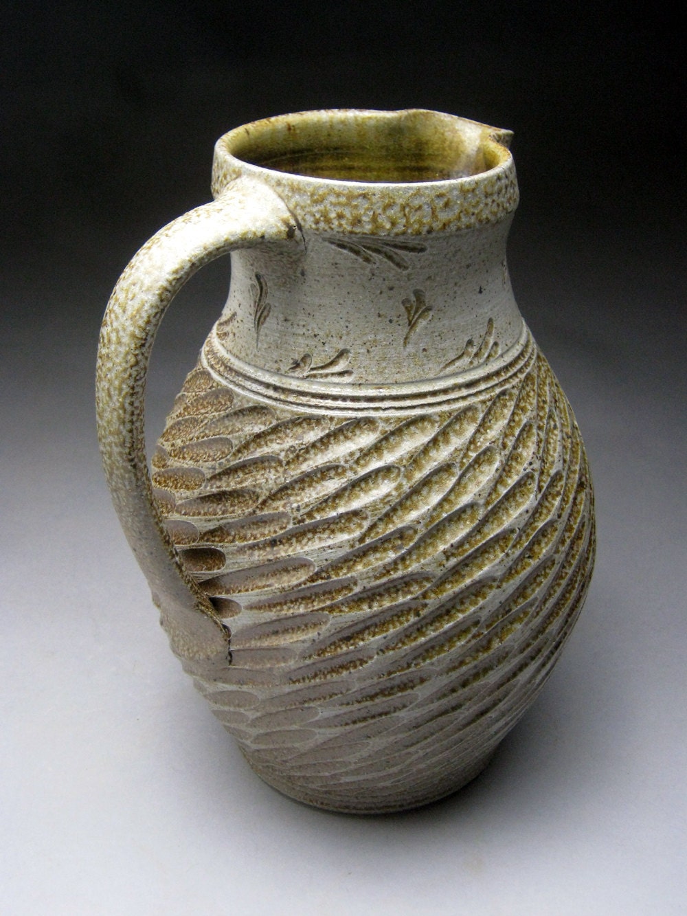 Woodfired Salt Glazed Pitcher with Carved Designs
