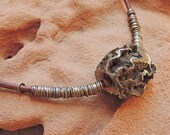 Pyrite Ammonite Focal Bead Necklace With Tribal Heishe on Leather Cord