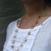 Lily of the Valley necklace - Statement necklace with small vintage style brass floral charms - Gold floral wedding bridal necklace