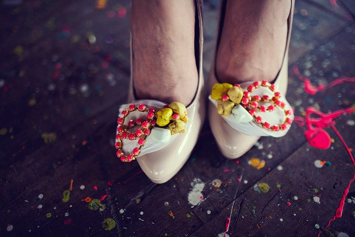 Rock Candy shoe clips with feathers in yellow, salmon, white, neon