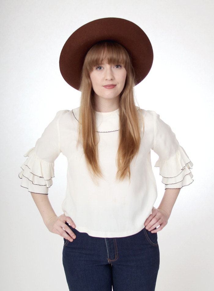 Vintage 1960s Off-White Ruffle Sleeve Blouse with Black trim - size medium