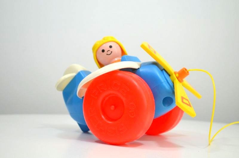 Vintage Fisher Price Toy Airplane and Pilot Complete with Pull String and Noise