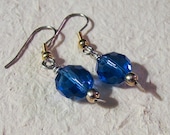 Clear blue bead dangle earrings
