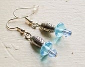 Blue disc and silver colored bead dangle earrings