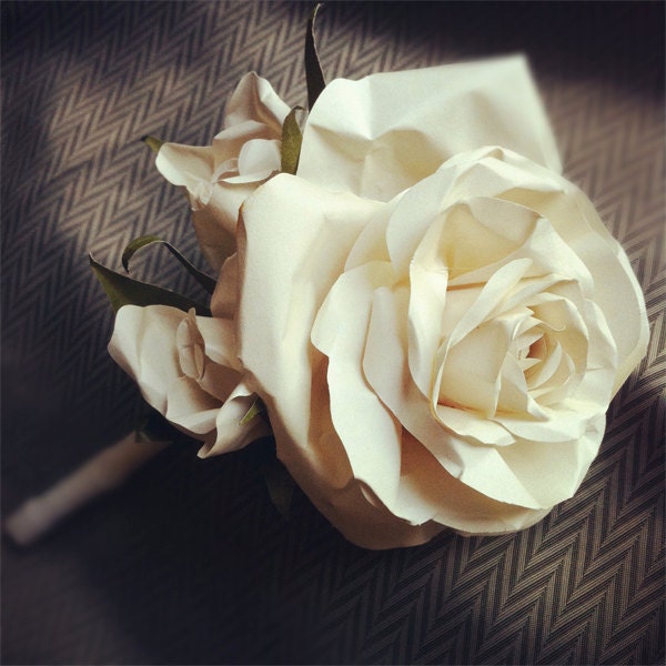 Classic button hole using crafted paper flowers: large rose and two small buds