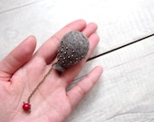Balloon brooch . Needle felted balloon brooch in natural grey , Mauve galvanized / metallic beads , Red coral beads hangs at the bottom . B6