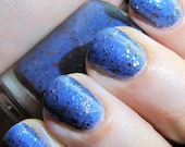 Raptor Girl Nail Polish - bright blue with orange glitter and more