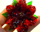 Upcycled Red Fantasy Flower with Black Stripes and Dots Made of Plastic Water Bottles