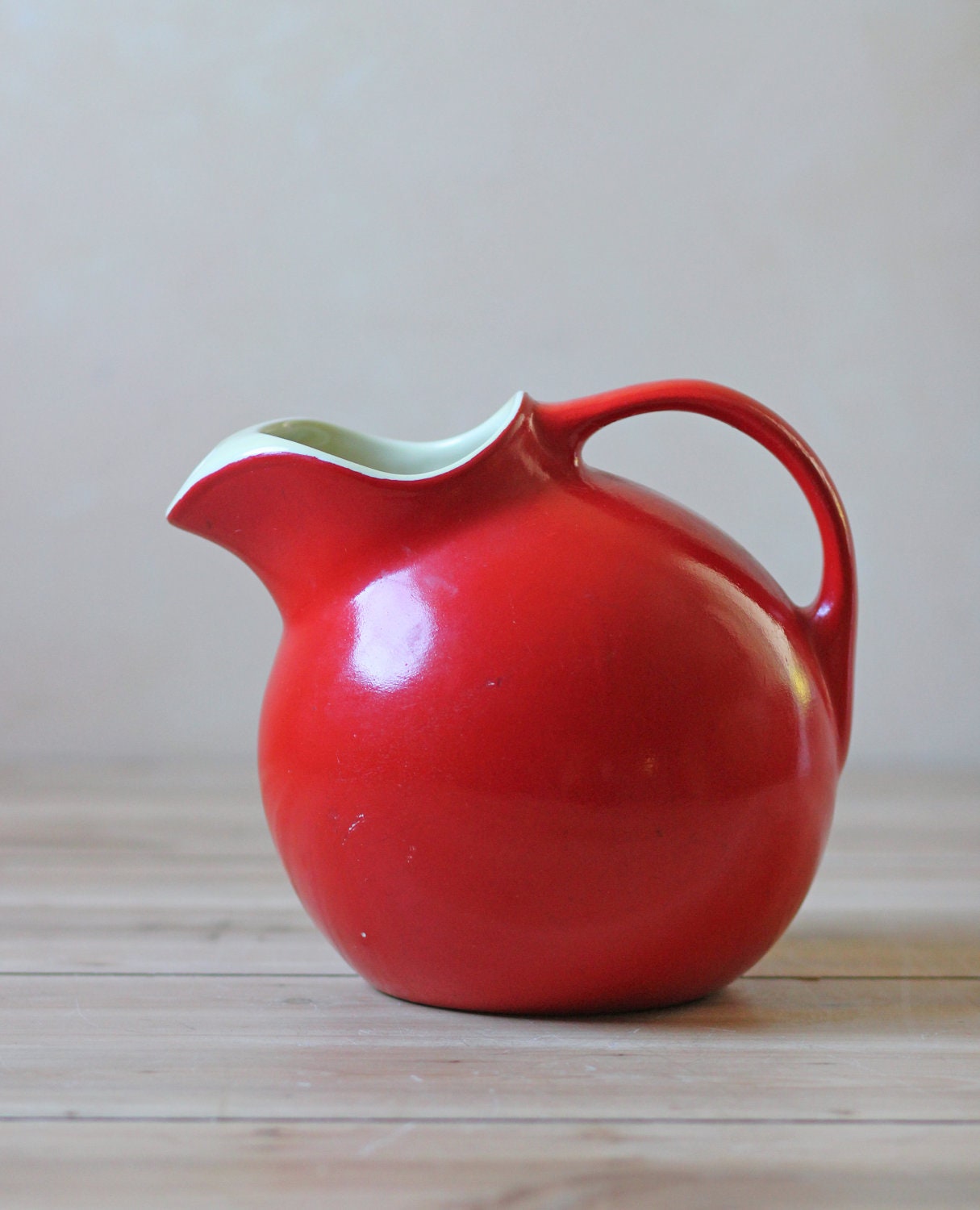 red ball water pitcher