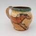 mug with two horses