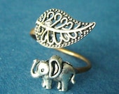 Silver elephant ring with a leaf wrap ring