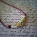 Boomerang- vintage glass  pendant and leather necklace