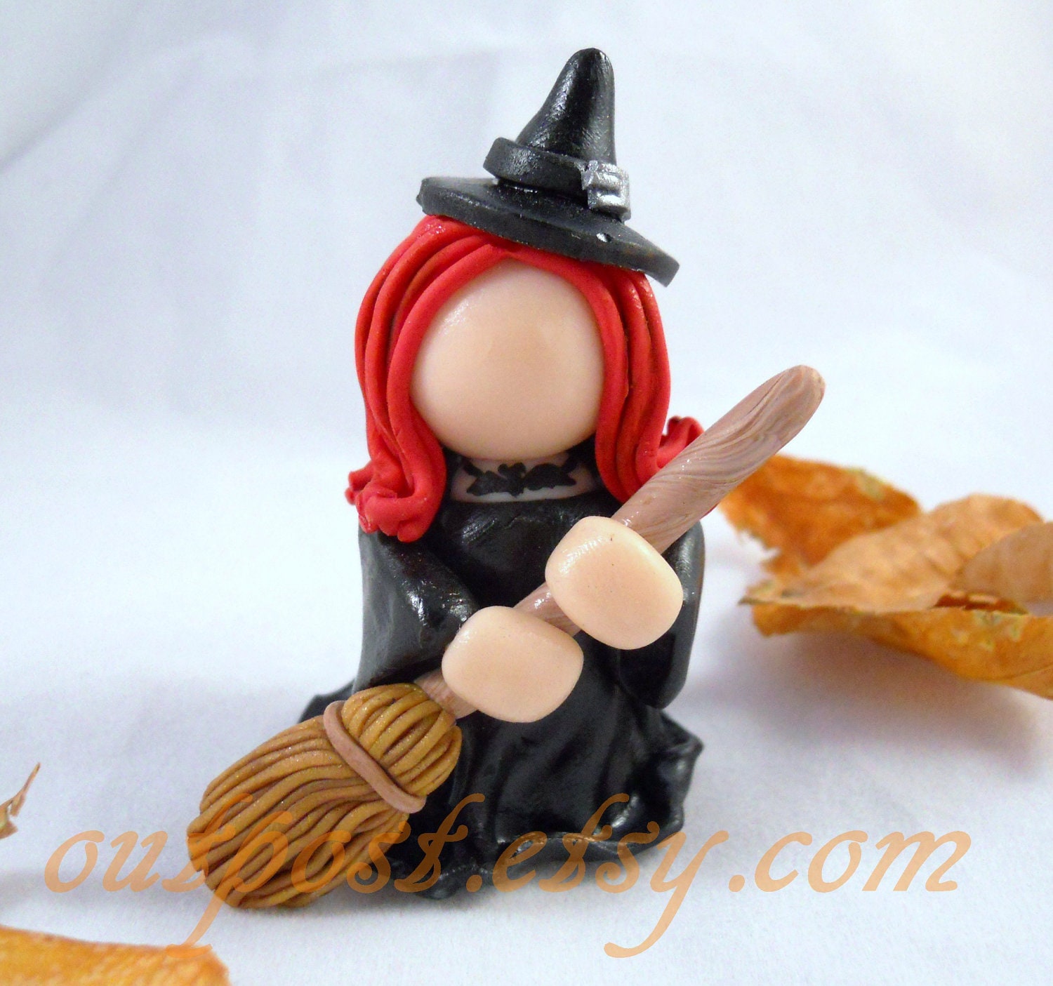 Autumn witch. Polymer clay figurine. Halloween.