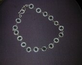 Necklace of Silvered Mesh rings around Hematite Beads
