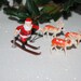 Vintage Miniature Novelty Snow Skiing Santa and Reindeer Christmas Display Set
