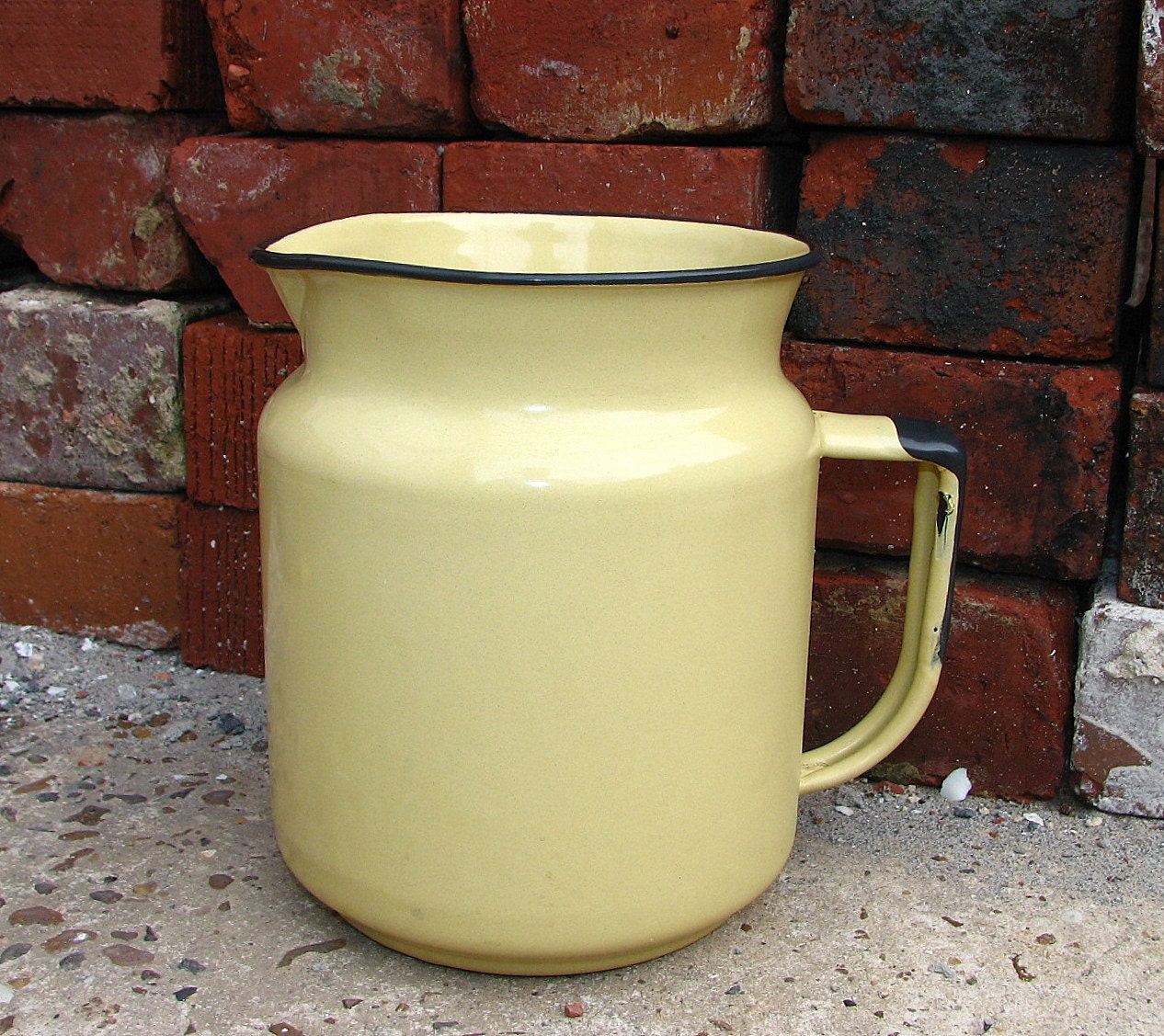 sweetly rustic duotone enamel pitcher -- black and pale yellow