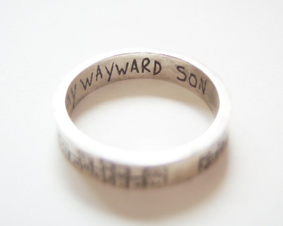 Supernatural cityscape etched silver ring with 'Carry On My Wayward Son' inscription