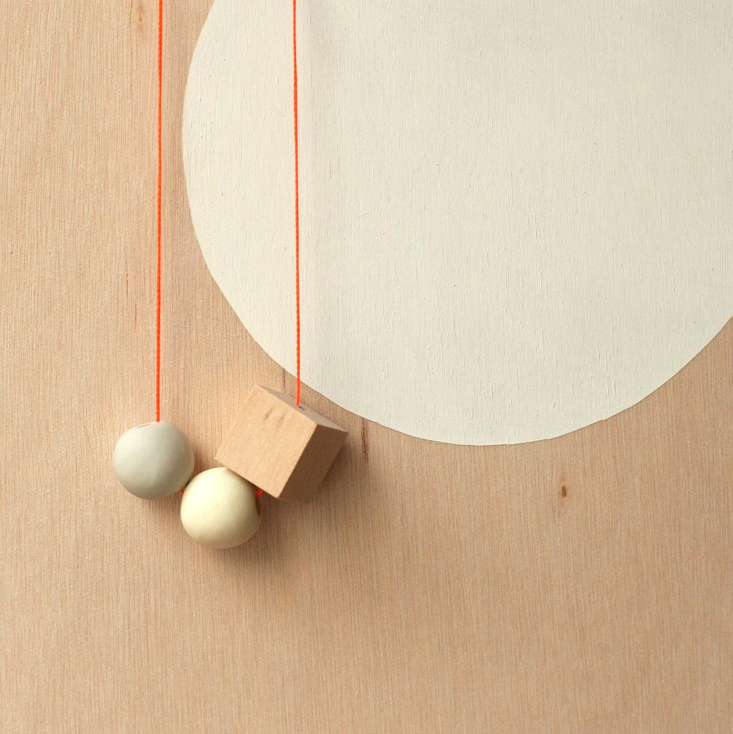 and a cube makes a necklace