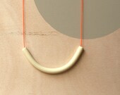 not quite a semi circle makes a necklace