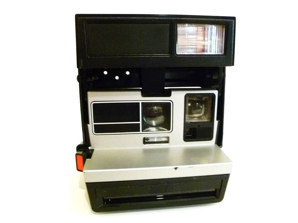 Vintage Polaroid Camera Sun