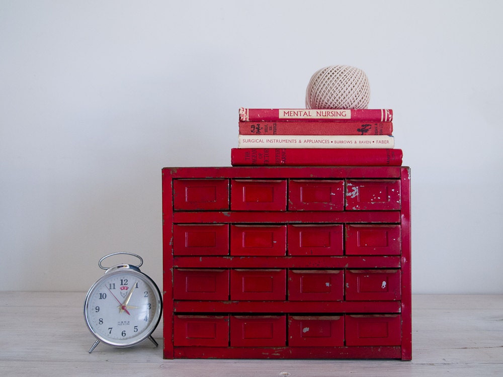 vintage industrial cherry red metal storage cabinet with 16 drawers