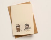 Bear loves Penguin Greeting Card